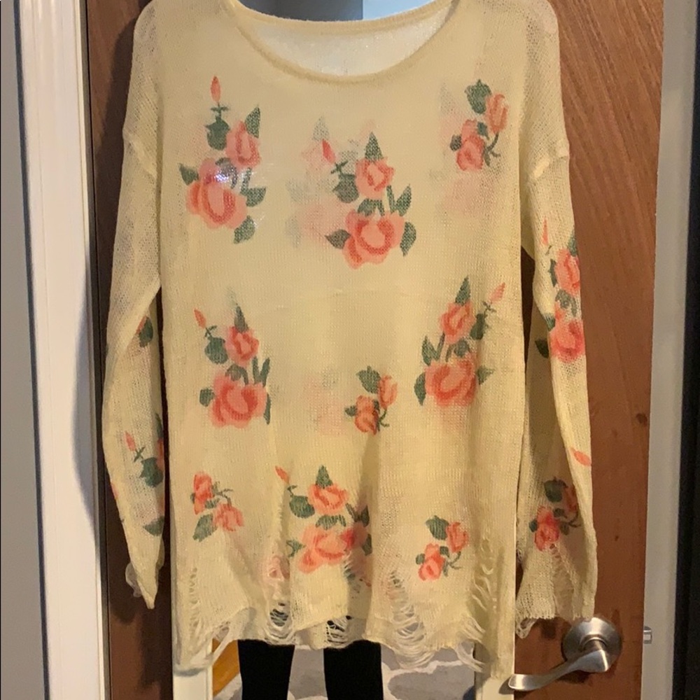 Distressed floral sweater